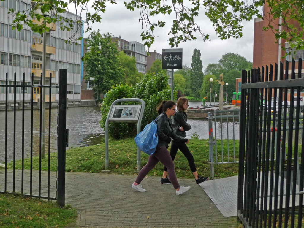 File:A photo of two students, walking on the university campus Roeterseiland, Amsterdam; high resolution im...