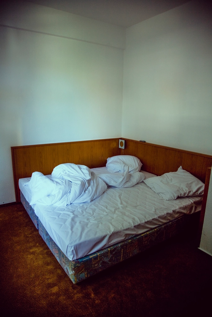 Bed in a hotel room