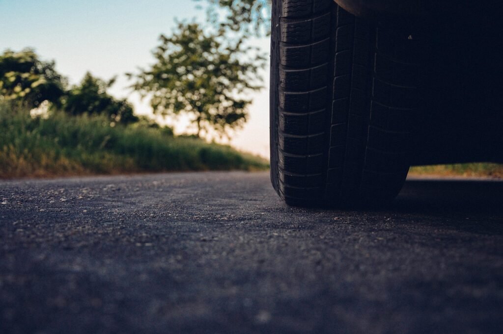 Close up car tire on road