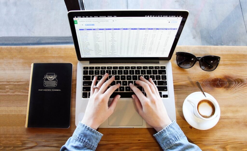 Cloth wiping laptop screen