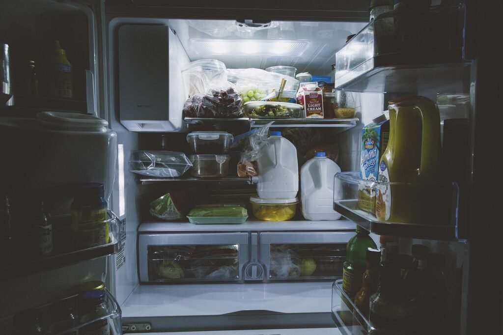 bottles, food, gallon, inside, light, milk, refrigerator, shelf, vegetables, refrigerator, refrigerator, refrigerator, refrigerator, refrigerator