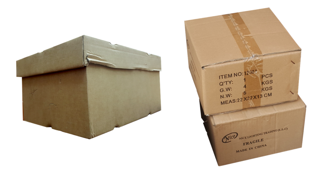 Two plain cardboard boxes, one taped shut, on a black background