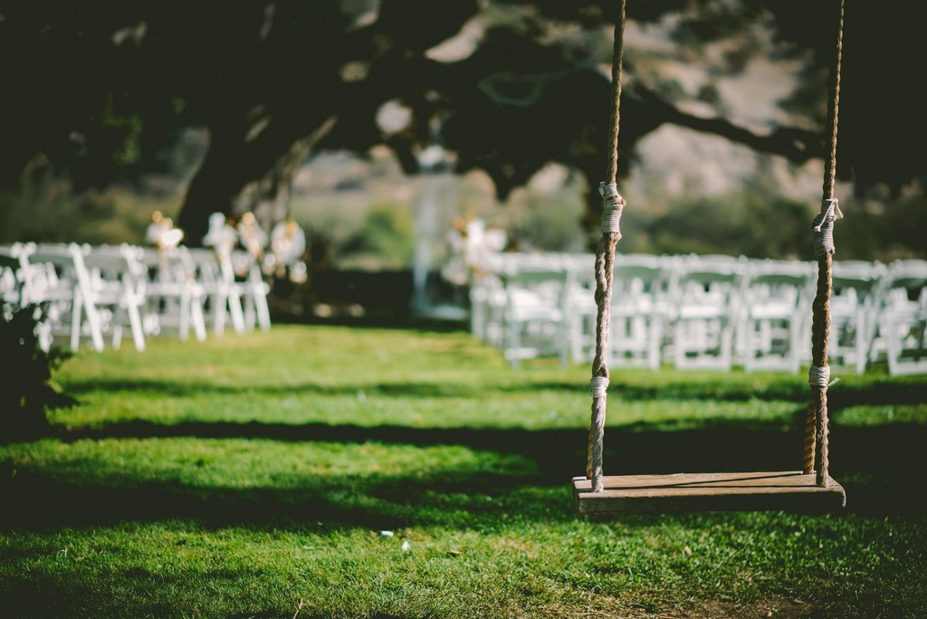 Wooden swing wedding ceremony chairs