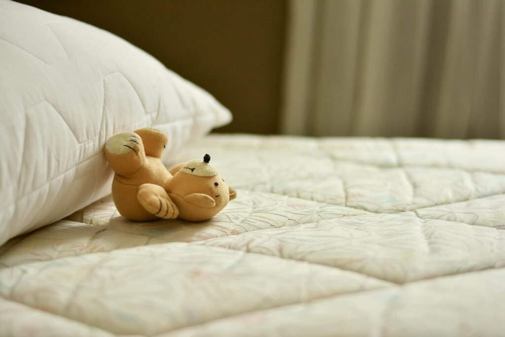 Vacuum nozzle on mattress seam