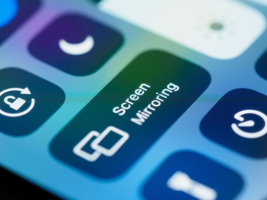 Close up of a smartphone control panel showing quick settings toggles