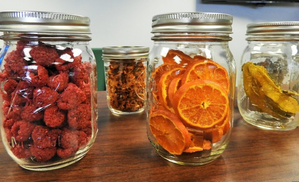 christmas background, mason jars, dehydrated, fruit, oranges, raspberries, preservation, canned, prepping, nutrition, slice, nature, healthy, dried, home, dehydrator, food, pantry, garden