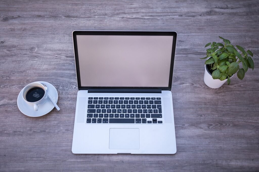 Laptop on wooden desk