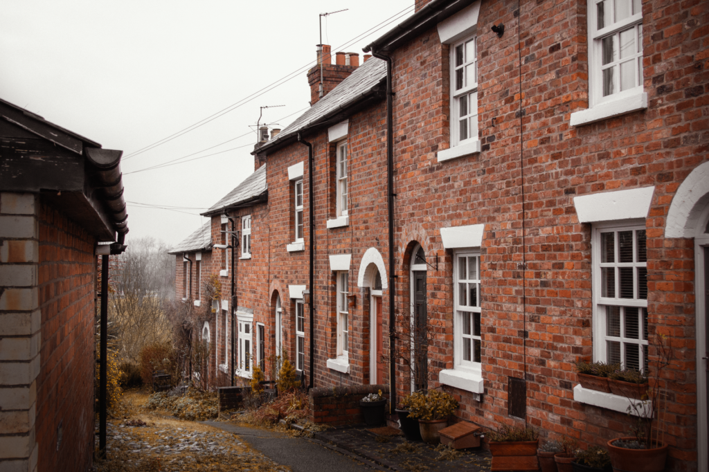 Picturesque view of traditional brick houses lining a quaint alley in Shrewsbury, England