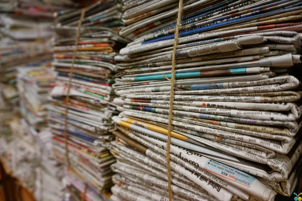 Stack of newspapers on a desk