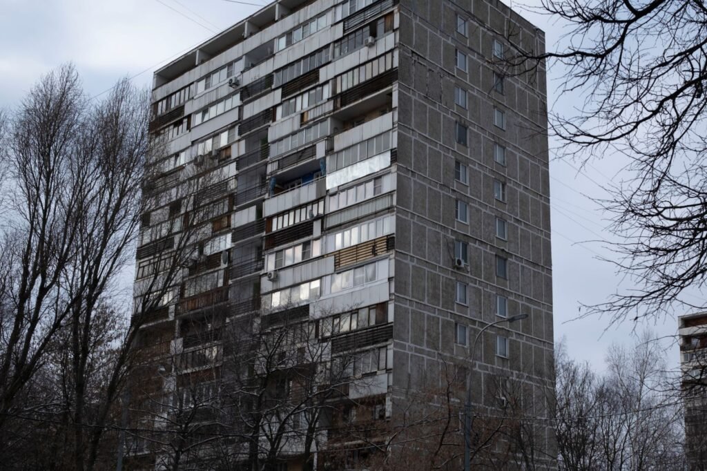 High-rise residential building showcasing Post-Soviet architecture in an urban setting