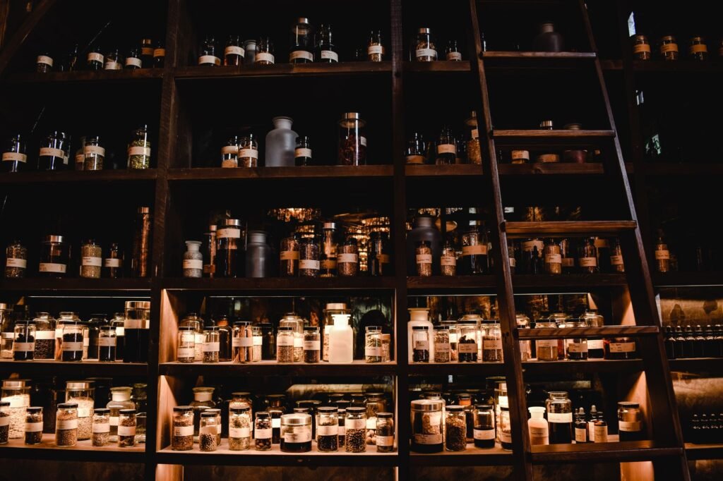 Dimly lit apothecary shelves filled with assorted glass bottles and jars, creating a vintage ambiance