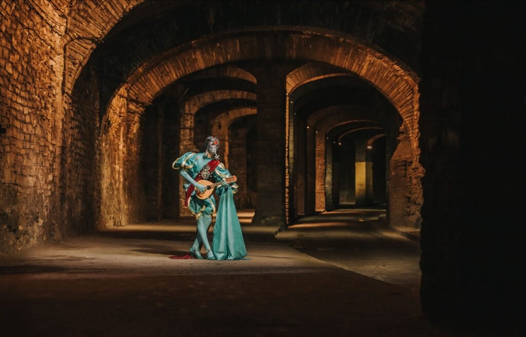A costumed bard playing a lute in a mystical medieval hallway, evoking fantasy themes