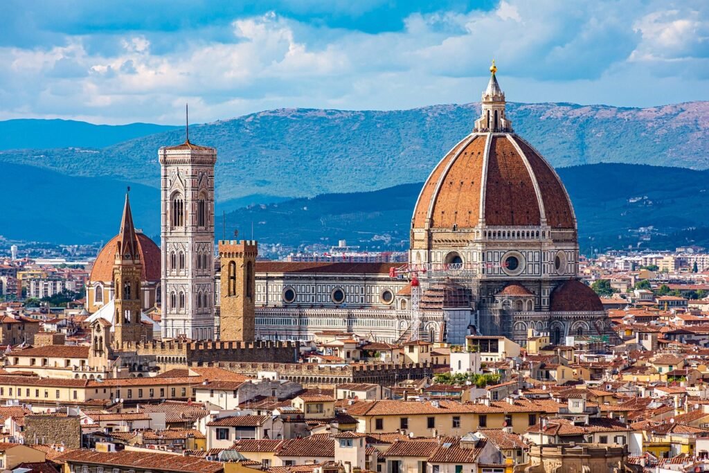The dome of Florence cathedral seen above the city rooftops