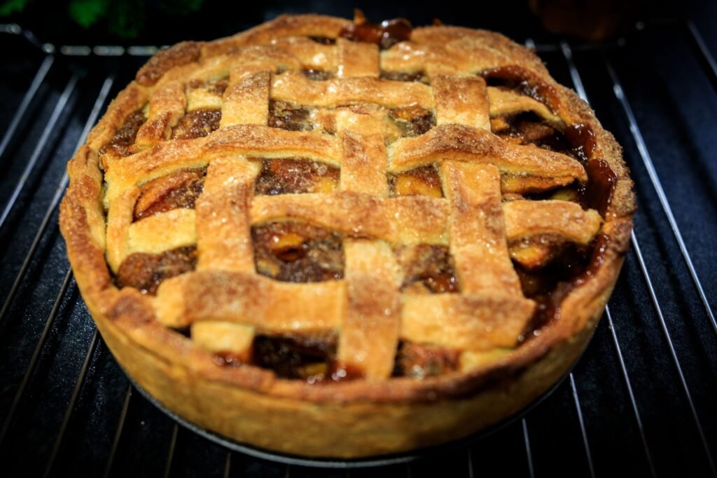 Delight in a perfectly baked homemade apple pie with a golden lattice crust