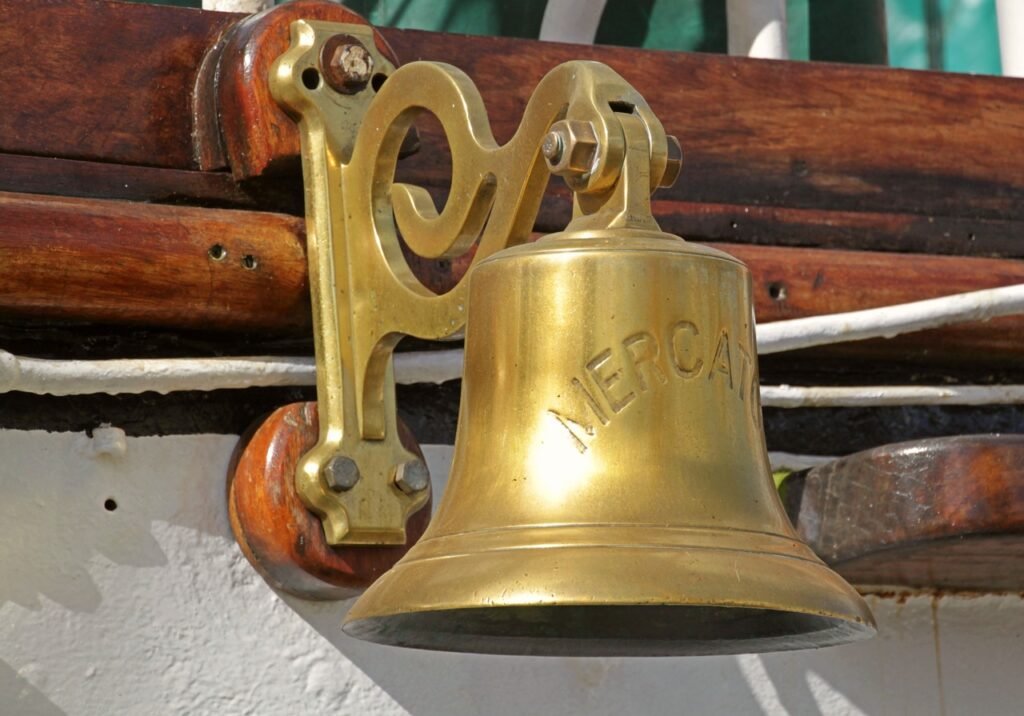 Brass ship bell on a deck