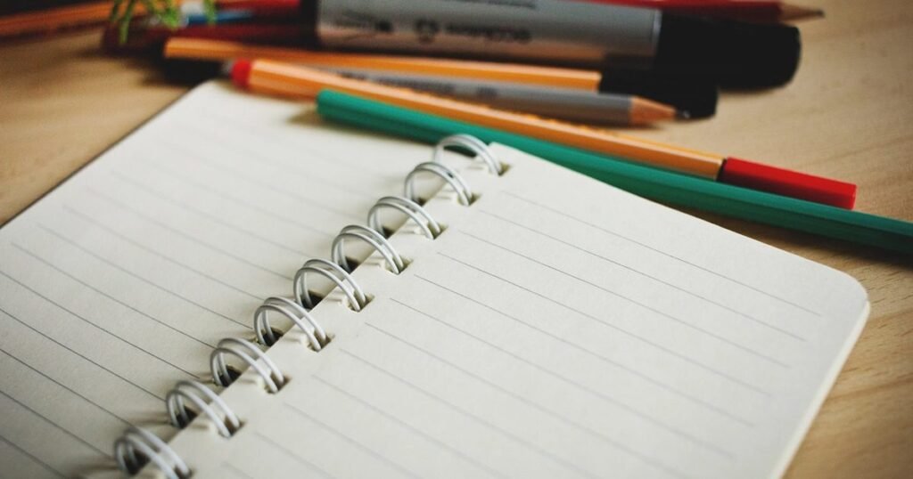 Free open notebook, pens pencils